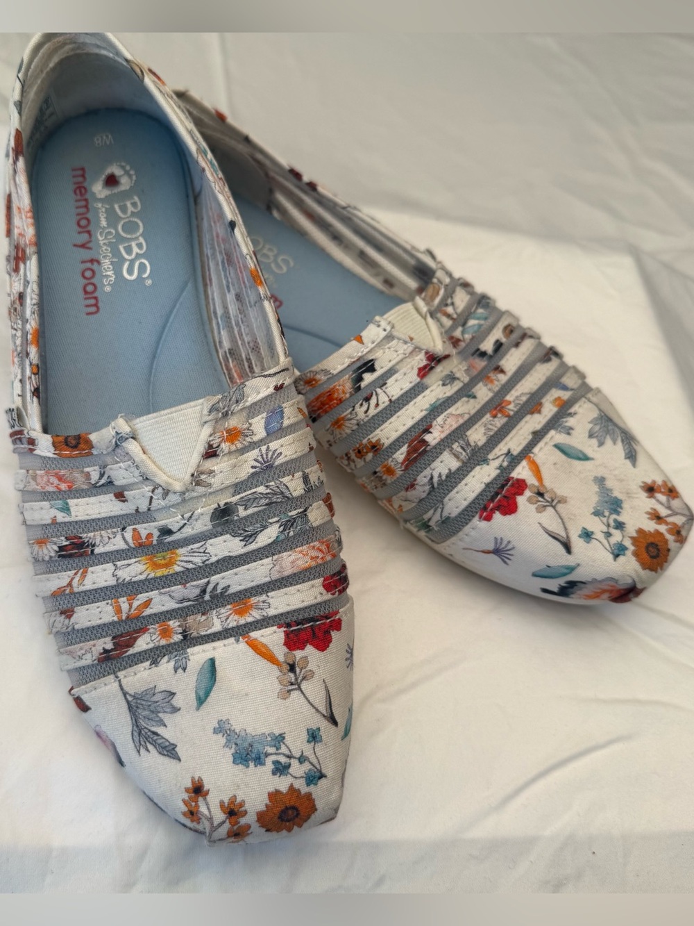 BOBS from Skechers White Floral Slip-On Flats with sheer strips